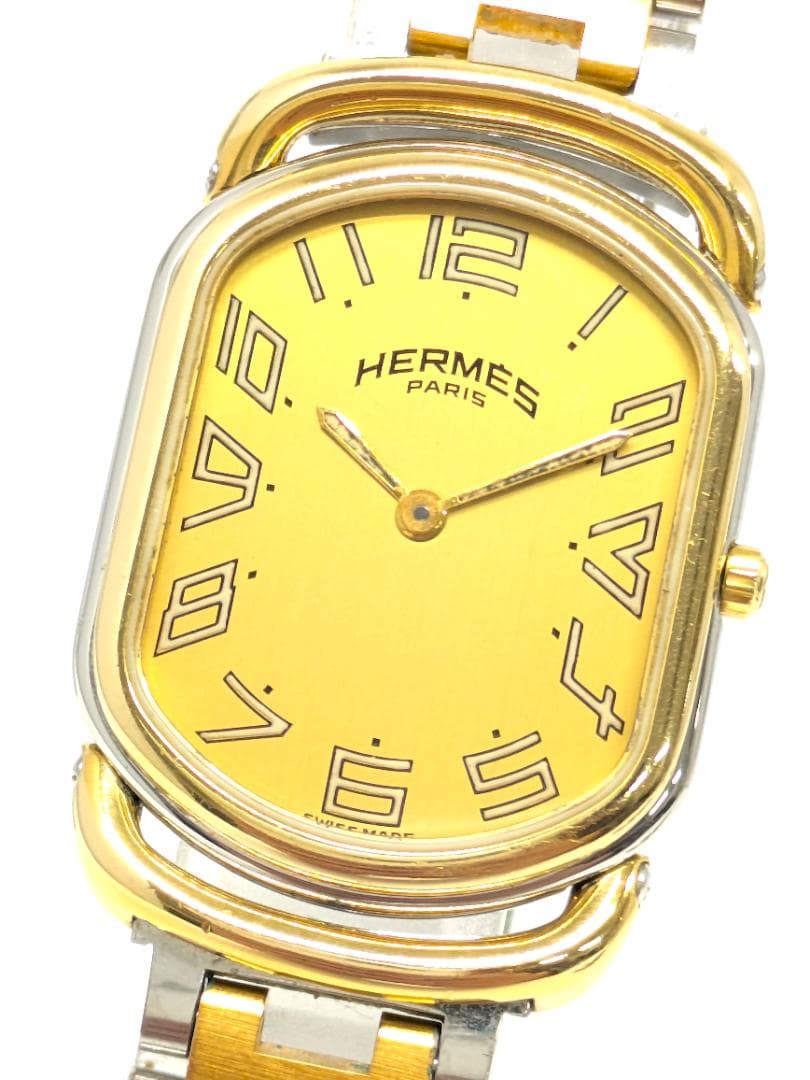 稼働/新品電池 HERMES エルメス ラリー ゴールド メンズ 腕時計 - メルカリ