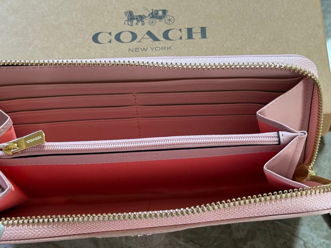 COACH ブラウン ピンク 長財布 - メルカリ